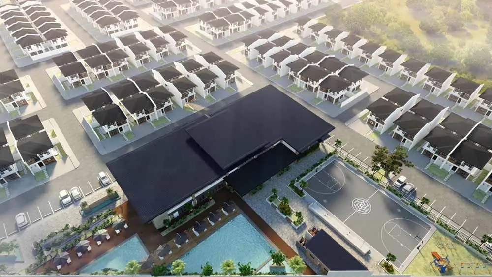 An aerial view of a modern residential community with a clubhouse.