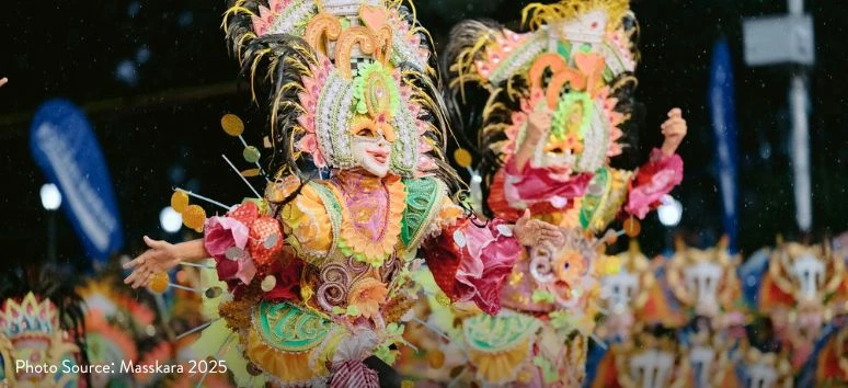 Colorful MassKara Festival parade showcasing the lively Bacolod known for festival spirit, a core value of the Likha Estates community.