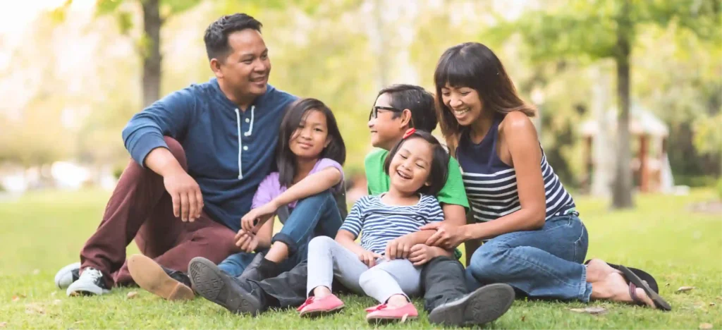 Family enjoying a peaceful weekend outdoors. Discover why things to do in Batangas are easily accessible from PHINMA Maayo San Jose.